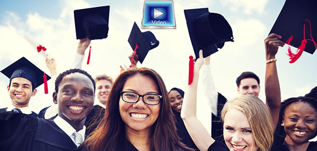 graduates holding caps in the air