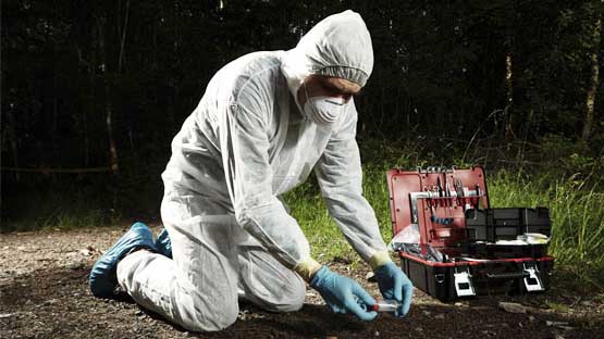 Person investigating crime scene