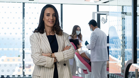 Female dental hygenist working on a patient