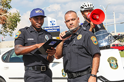 Two public safety officers on the field